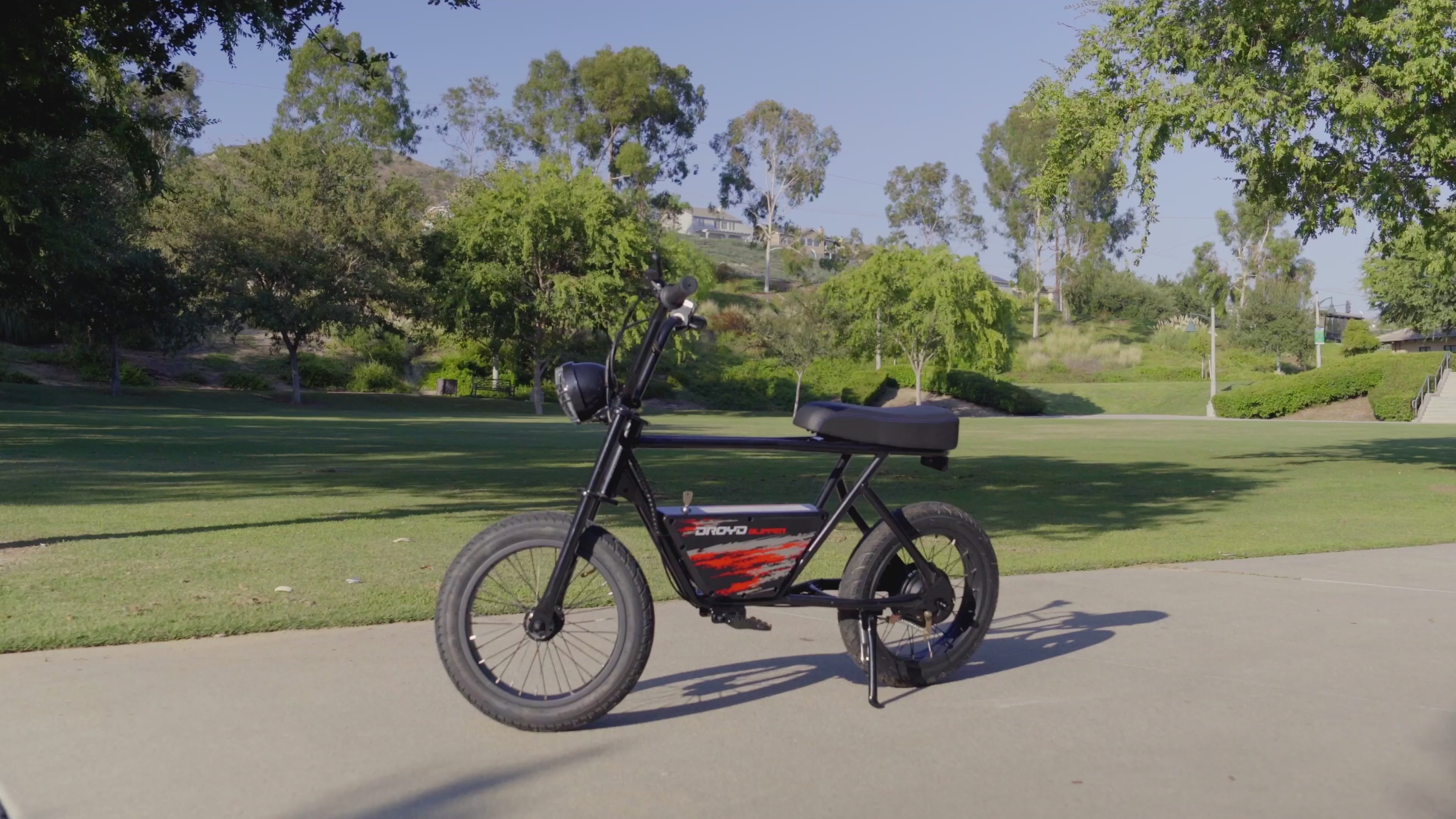 Older kids playing on Blipper products and riding around paved trails