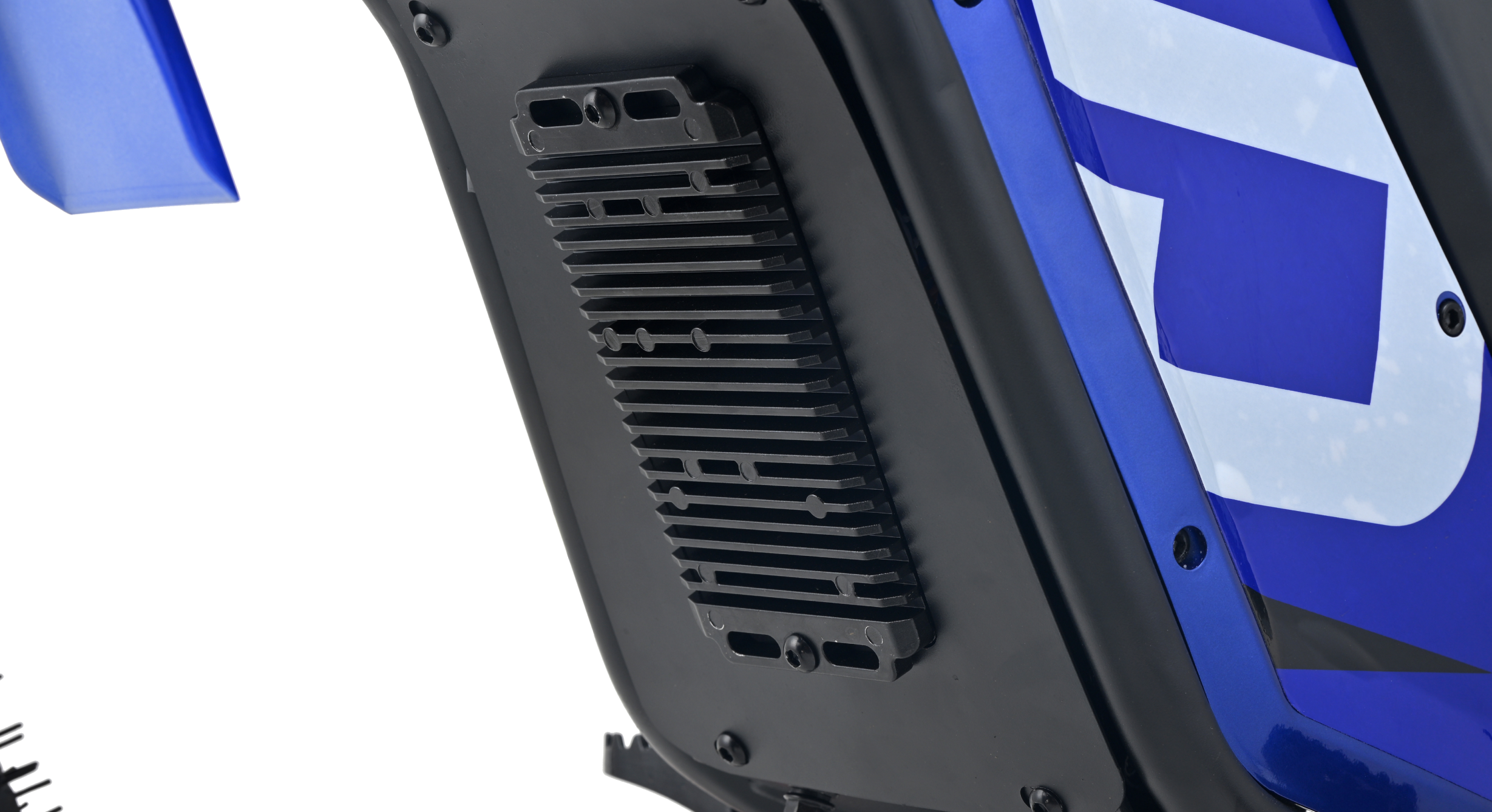 Close-up of a blue and black vehicle with a prominent brand logo on a white background